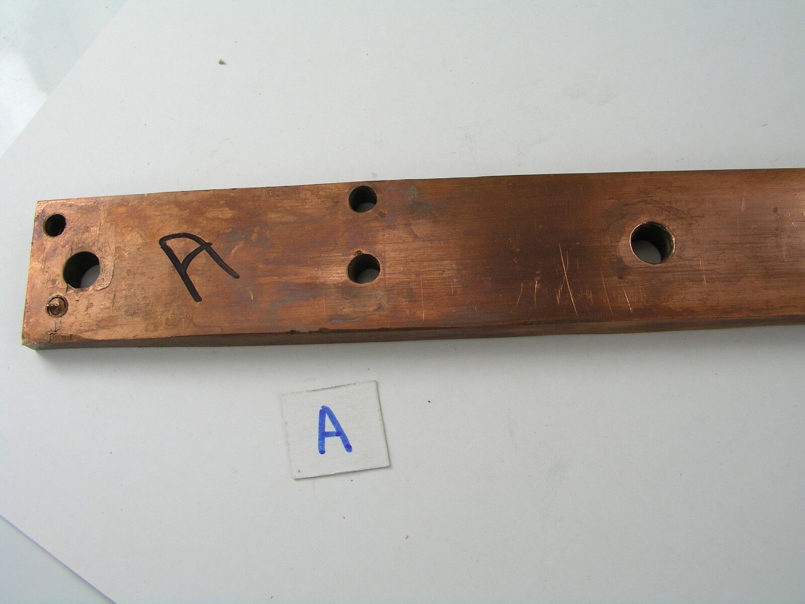 3/8" Flat Copper Bar 1-1/4" Wide x 37-3/8" Long               lot A Gallery Image 0 3/8" Flat Copper Bar 1-1/4" Wide x 37-3/8" Long               lot A - Image 2