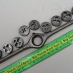 10 pc Vintage J.M. Carpenter Die Handle With Dies